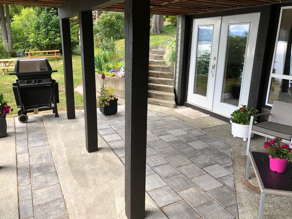 Private patio with barbeque, picnic tables and fire pit