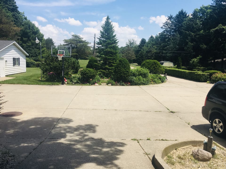Backyard  (Round garden, basketball court and football size field)