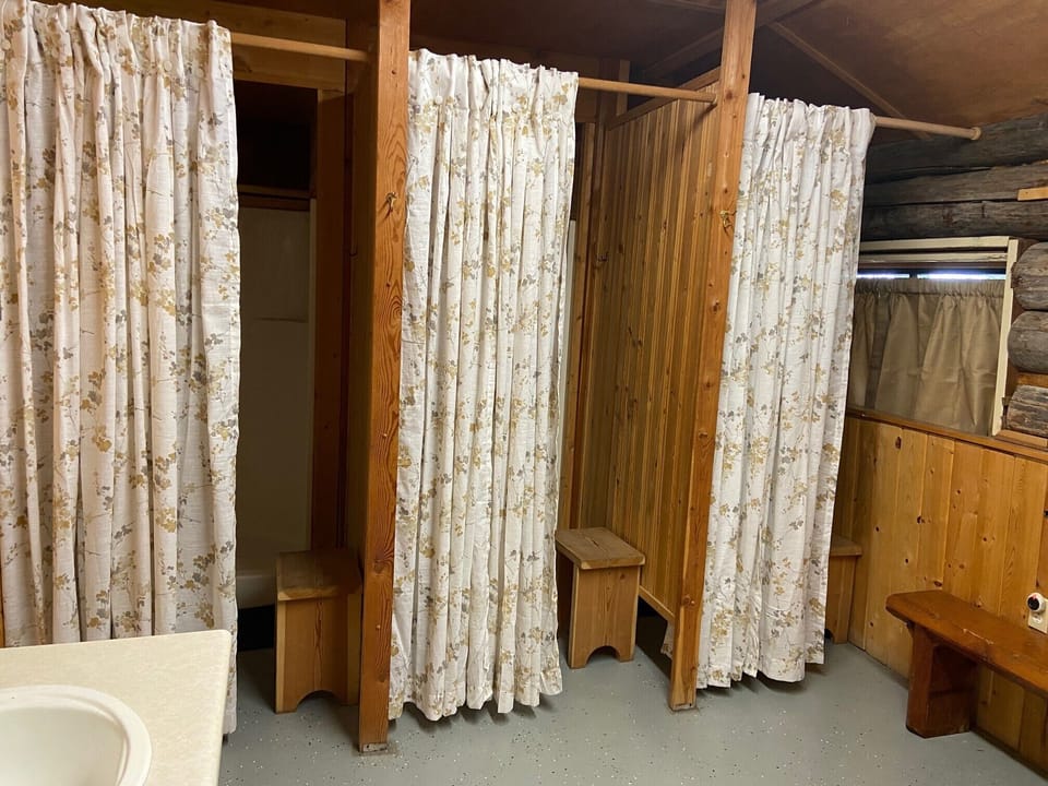 Bathroom is in community building as this is a dry cabin.