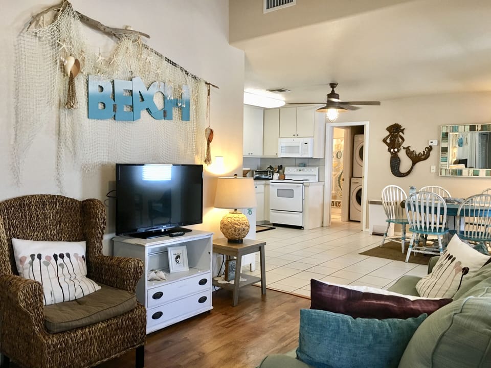 Living room looking into kitchen/dining 