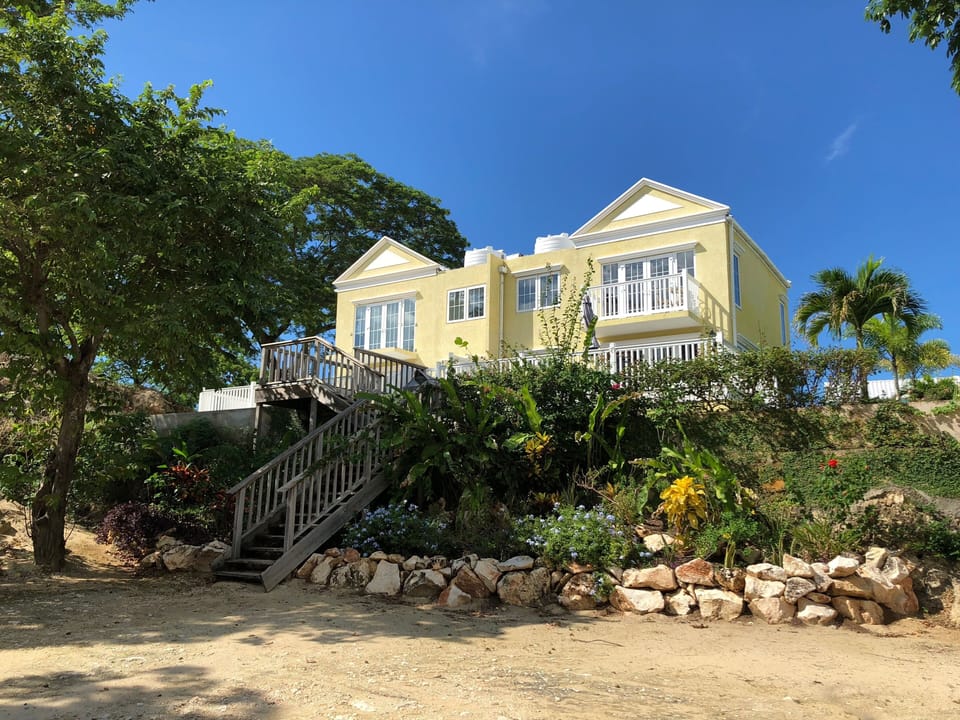 Little Bay Townhouse from the beach.  Our home is on the right hand side.