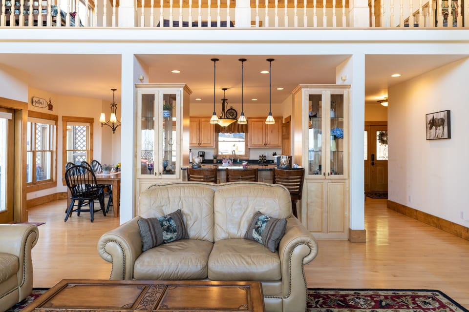 Open concept to the kitchen, dinning and great rooms.