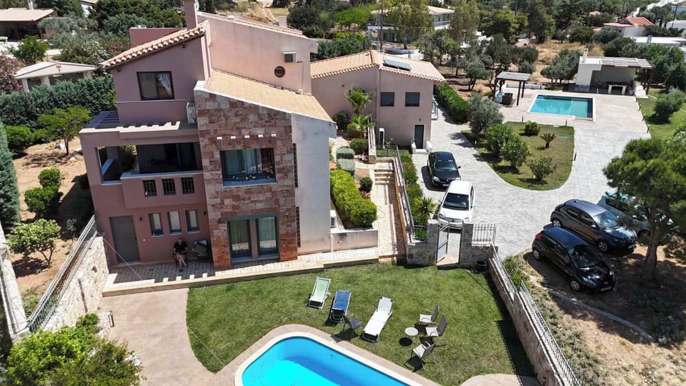 THE VILLA IS THE LEFT (THREE LEVEL) HOUSE