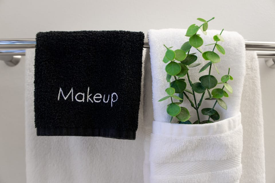 Makeup towels, and extra toiletries and products stocked in all full baths.