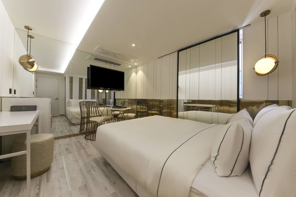 Deluxe Room | Premium bedding, down comforters, memory foam beds