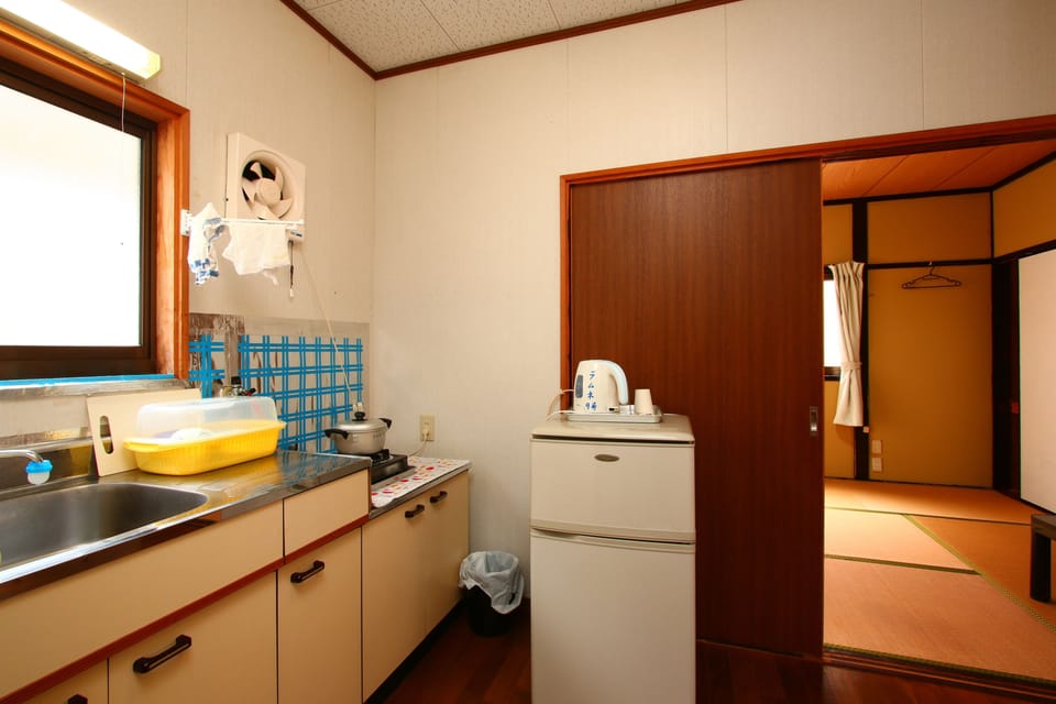 Fridge, microwave, cookware/dishes/utensils