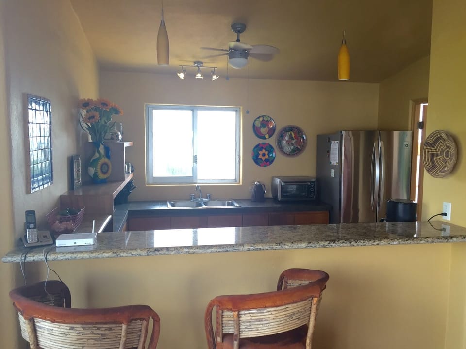 Newly remodeled kitchen with granite and tile