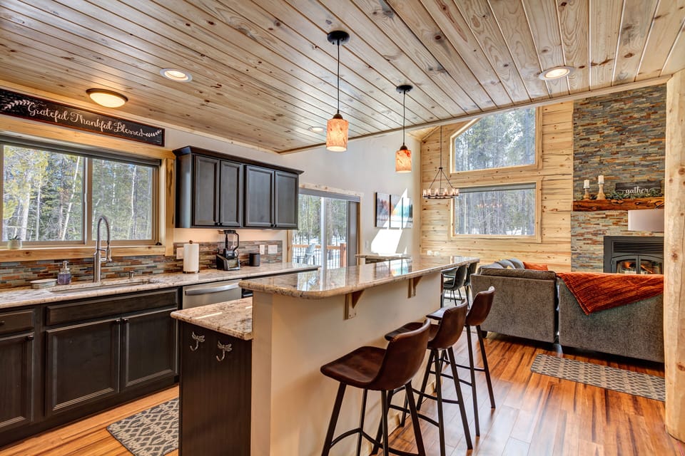 Never miss any action in the Great Room from the adjoining kitchen.
