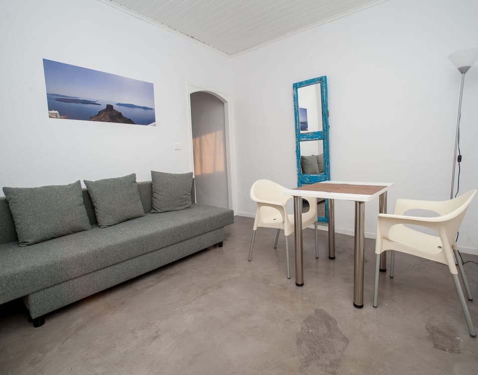 Panoramic Suite, Terrace, Sea View | Living room | Flat-screen TV