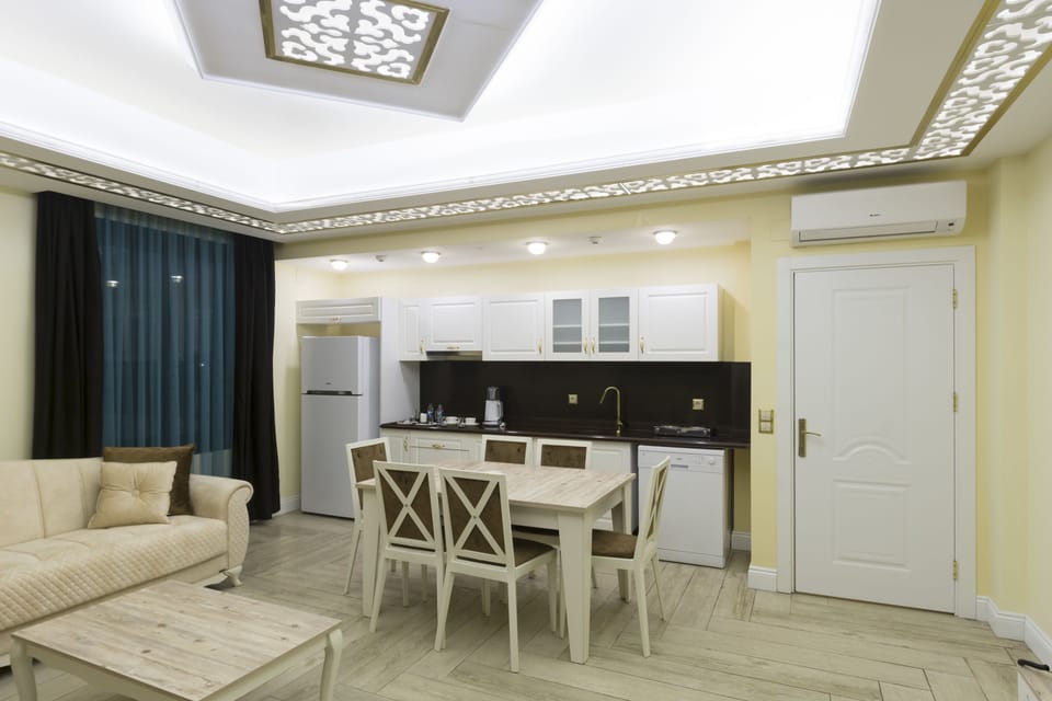 Luxury Suite, Partial Sea View | 1 bedroom, Egyptian cotton sheets, premium bedding, in-room safe