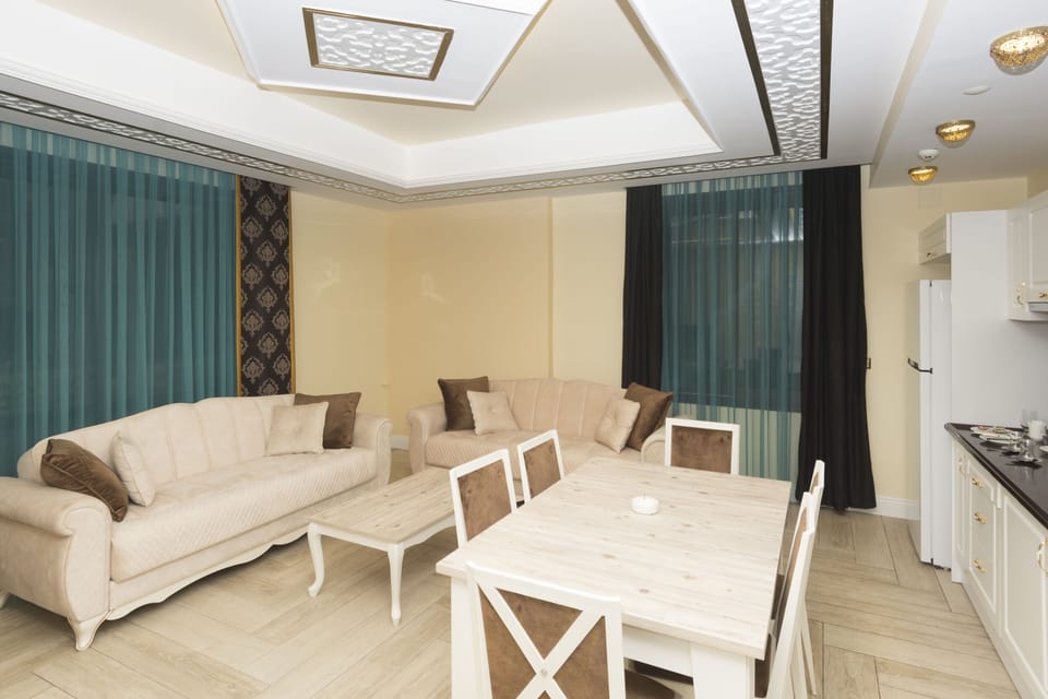 Luxury Suite, Partial Sea View | 1 bedroom, Egyptian cotton sheets, premium bedding, in-room safe