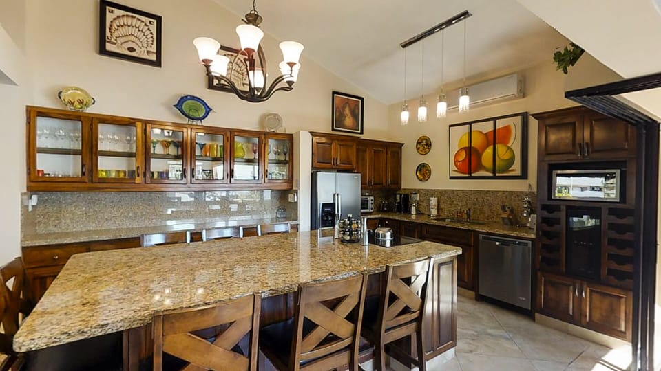 Granite Island in the kitchen with seating for 10