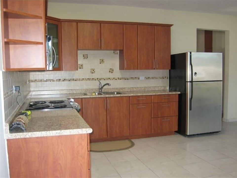 Full size kitchen with stainless Steel appliances