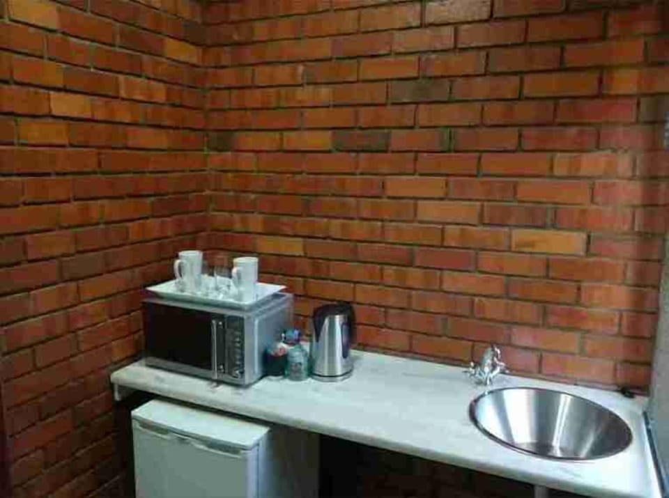 Standard Double Room | Private kitchenette | Fridge, microwave, coffee/tea maker, electric kettle