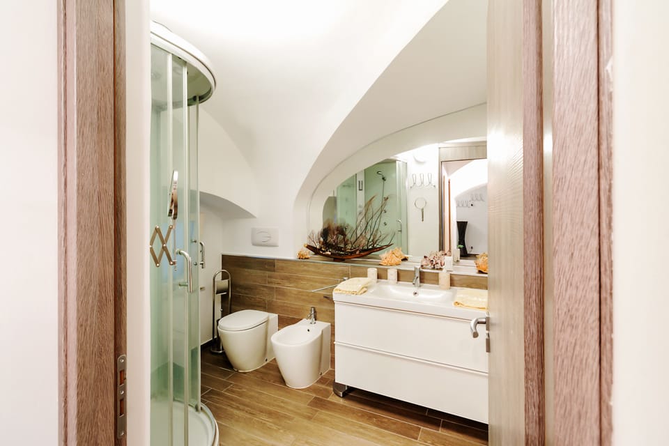 Apartment, 2 Bedrooms | Bathroom | Shower, hair dryer, bidet, towels