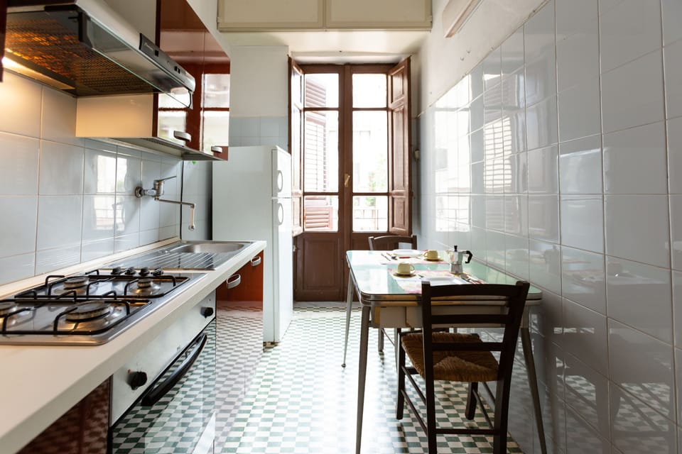 Apartment, 4 Bedrooms | Private kitchen | Full-size fridge, oven, stovetop, electric kettle