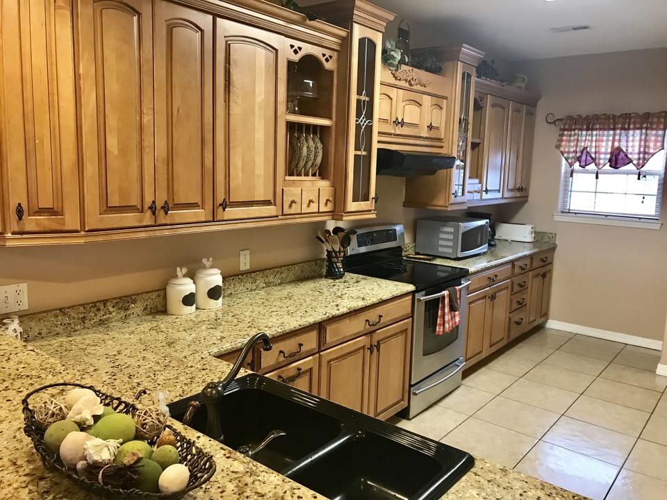 Kraftmaid kitchen with all appliances, electric griddle, crock pot, blender. 