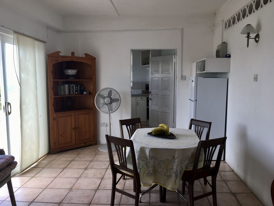 Dining area with sliding door to balcony