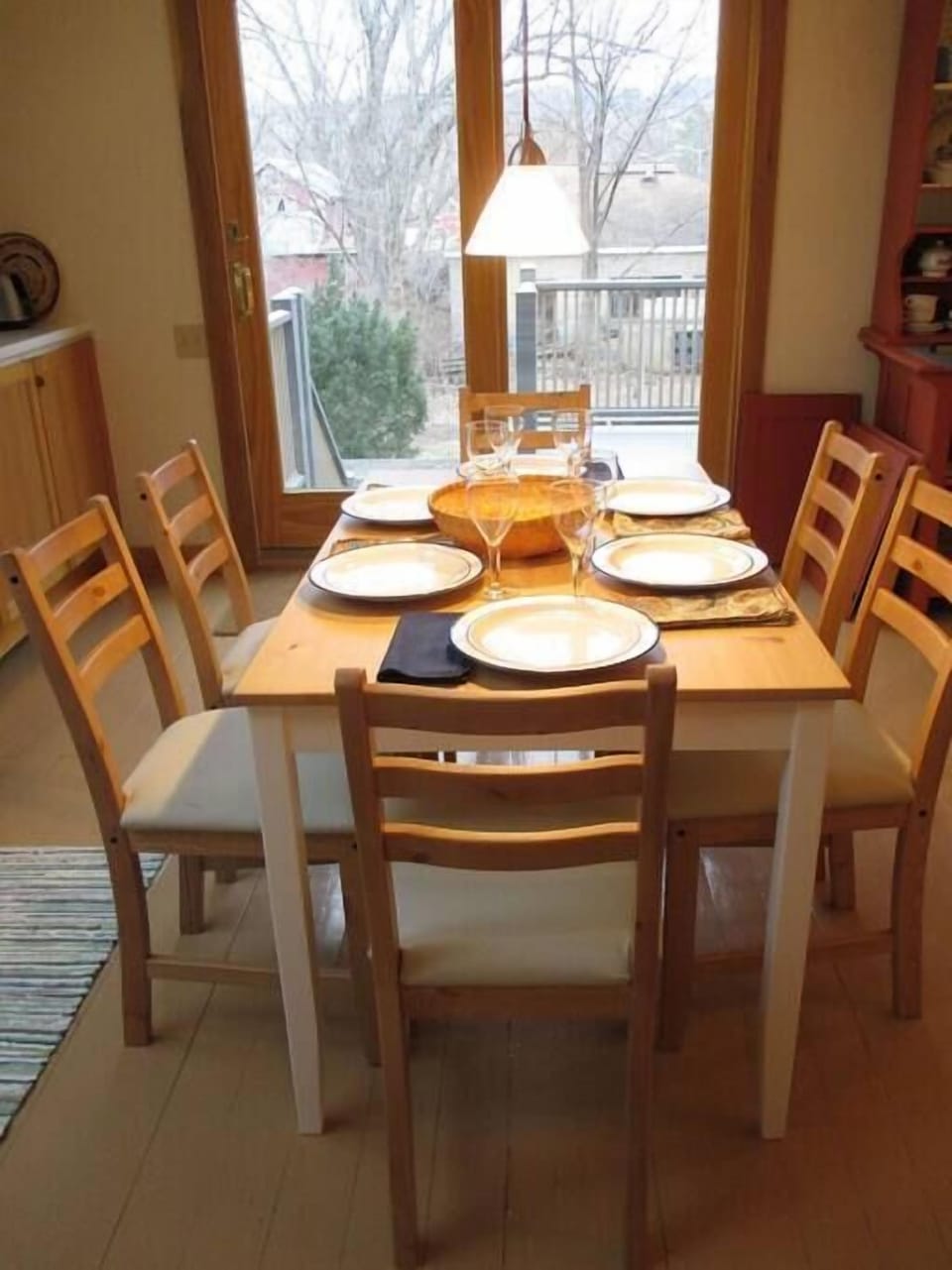 Dining for up to eight overlooking the deck and back yard