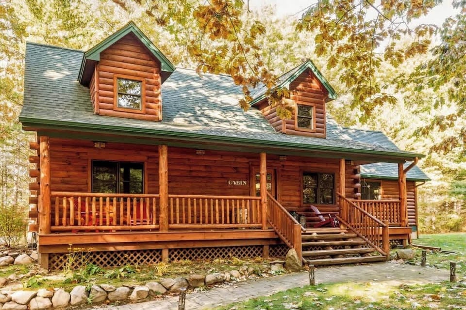 Eagles Landing tucked into two private wooded acres near Bellaire — a secluded Northern Michigan retreat minutes from Torch Lake and the Chain of Lakes