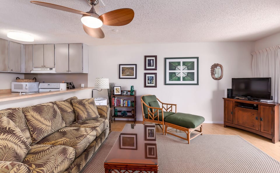 Open and spacious living area with a full kitchen.