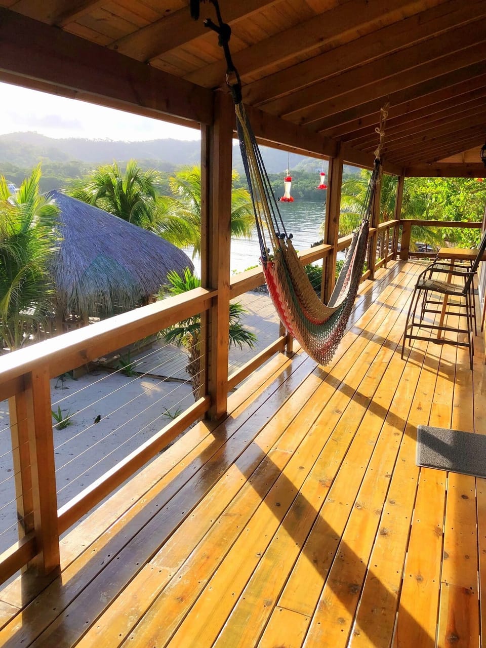 Enjoy tropical breezes all year long from our deck. Sunrises and moonrises too!