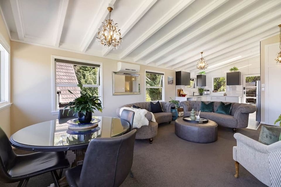 Open plan living with vaulted ceilings at Walk to Town 41A Alpine Chalet Queenstown