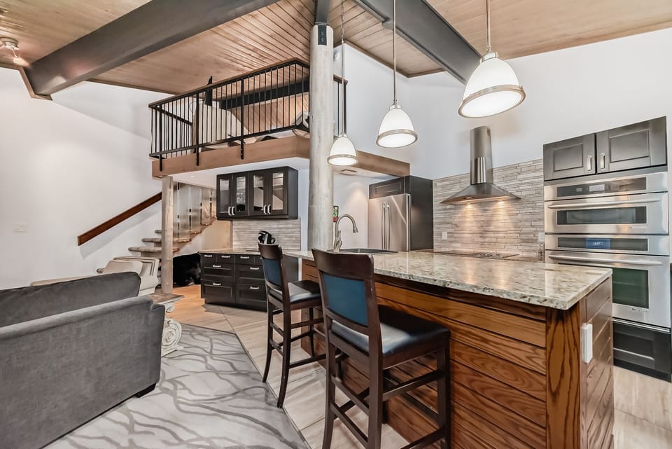 Cavell Penthouse Suite -No AC-fans provided | Private kitchen | Coffee/tea maker, fridge, electric kettle
