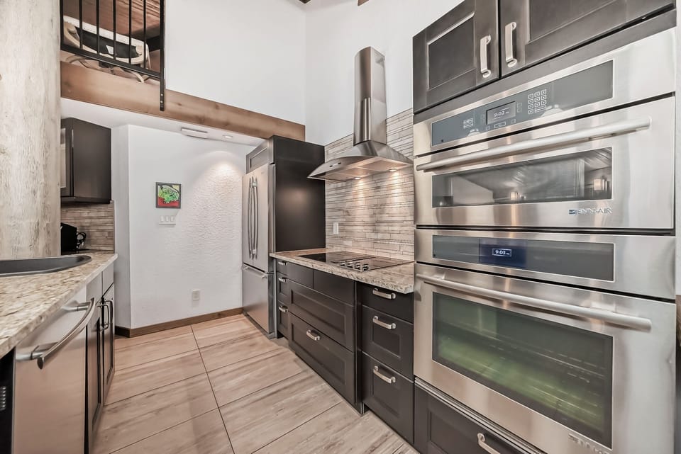Cavell Penthouse Suite -No AC-fans provided | Private kitchen | Coffee/tea maker, fridge, electric kettle