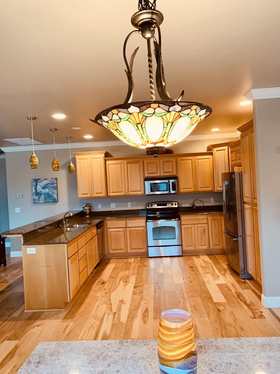 Light over dining room table and kitchen 