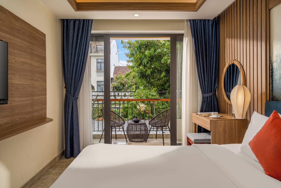 Deluxe Twin Room, Balcony, City View | Minibar, in-room safe, laptop workspace, blackout drapes