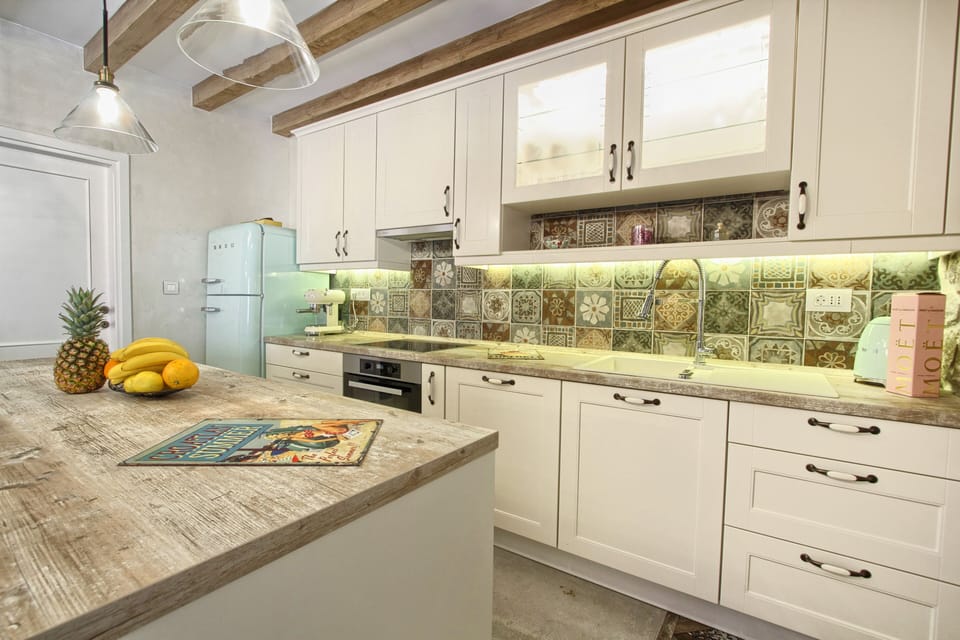 Villa | Private kitchen | Fridge, microwave, oven, stovetop