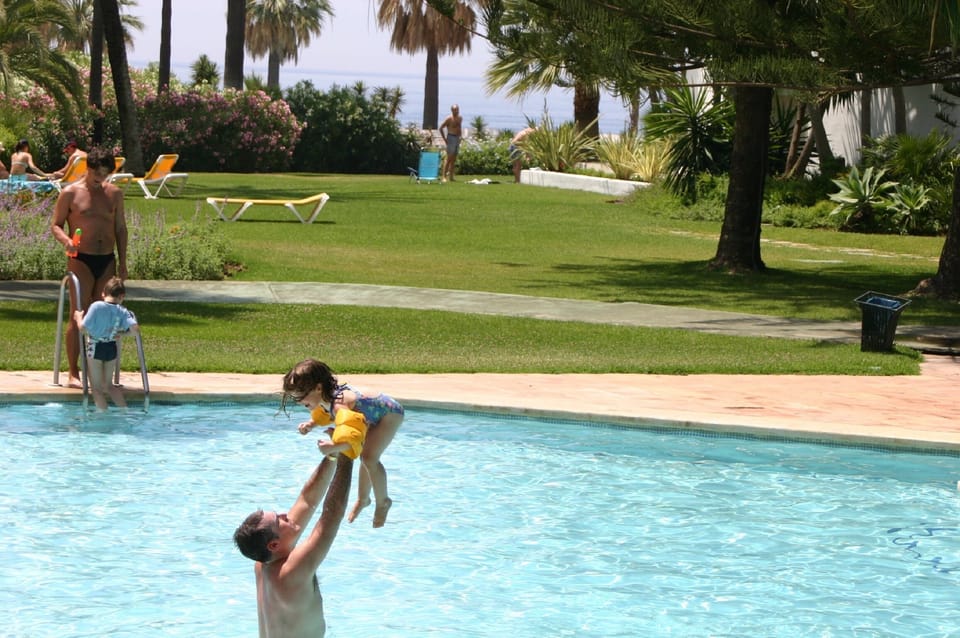 Family fun in one of three pools with the Mediterranean sea in the background