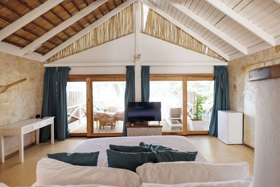 Family Loft, Multiple Beds, Beach View | Desk, WiFi (free), bed sheets