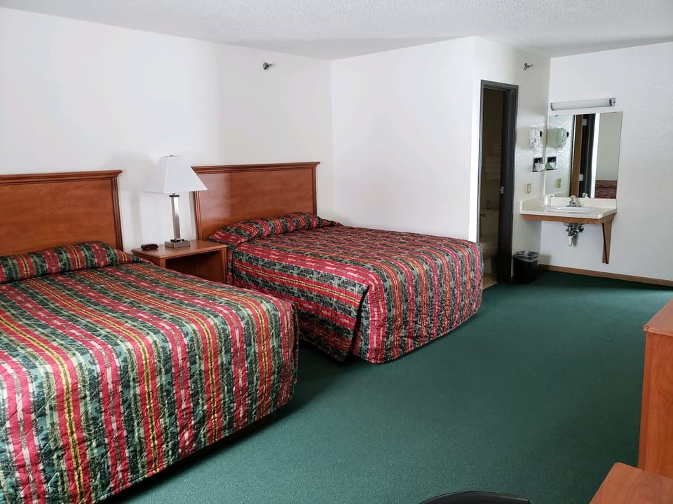 Classic Single Room, 2 Queen Beds | Desk, laptop workspace, blackout drapes, iron/ironing board