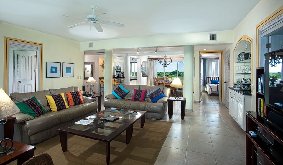 Living room has state of the art entertainment center w/HDTV and bar 