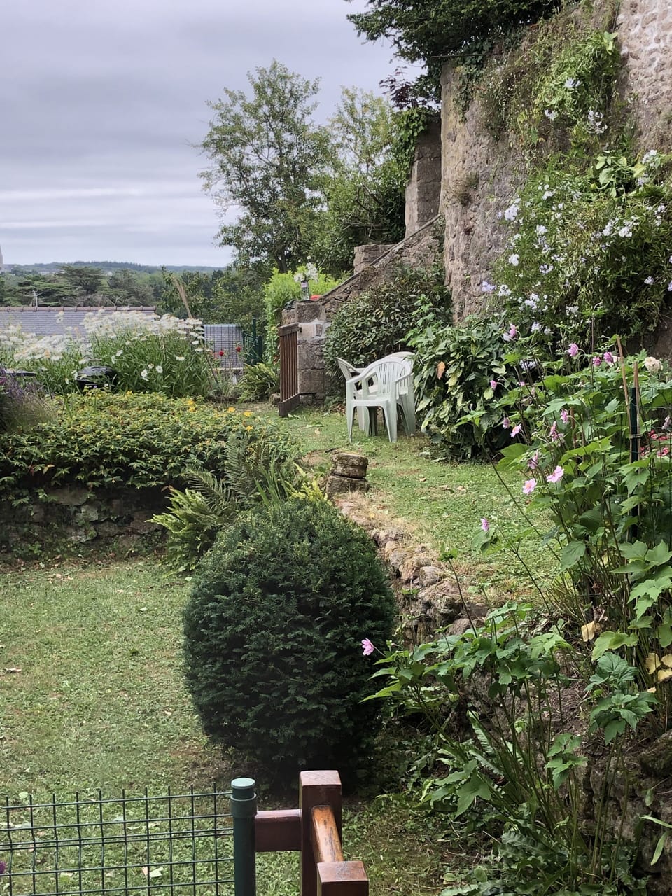 Walled private garden, part of 13th century Chateau Auray area. 