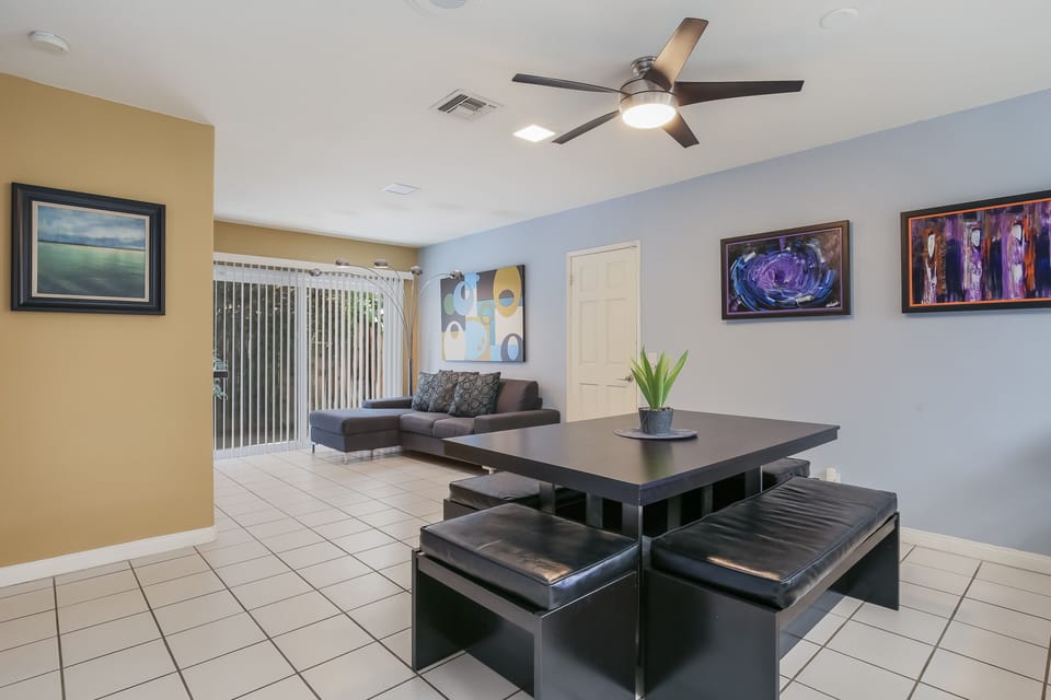 Eating area off kitchen looking over to tv watching area