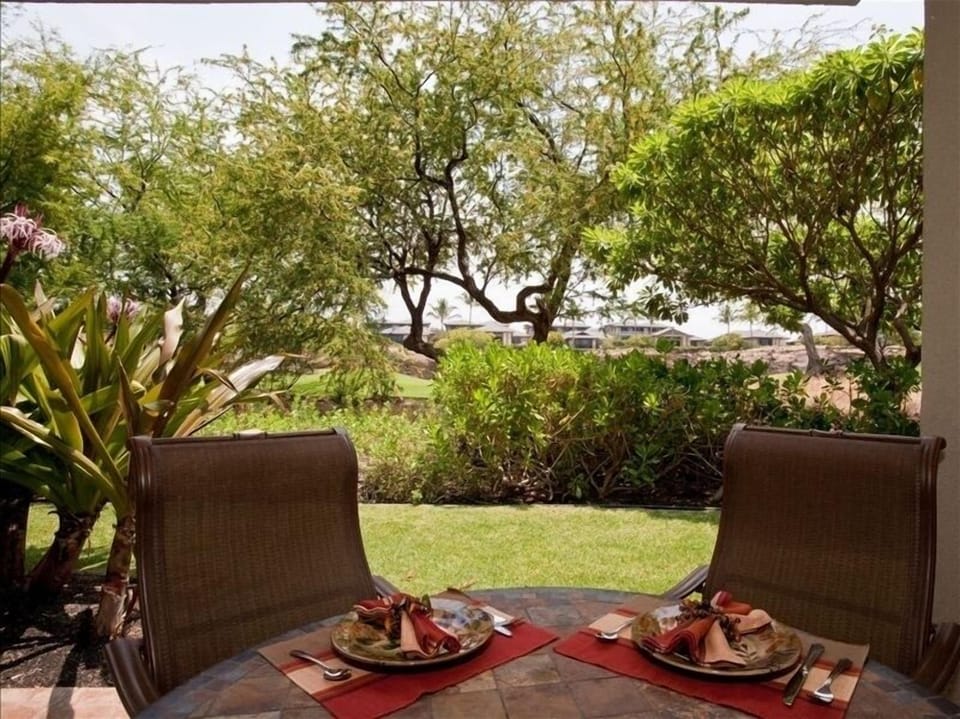 View from Dining room looking out to Lanai and golf course