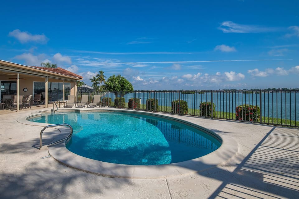 Lovely Heated Pool with expansive bay view, no bridges to open water for boats