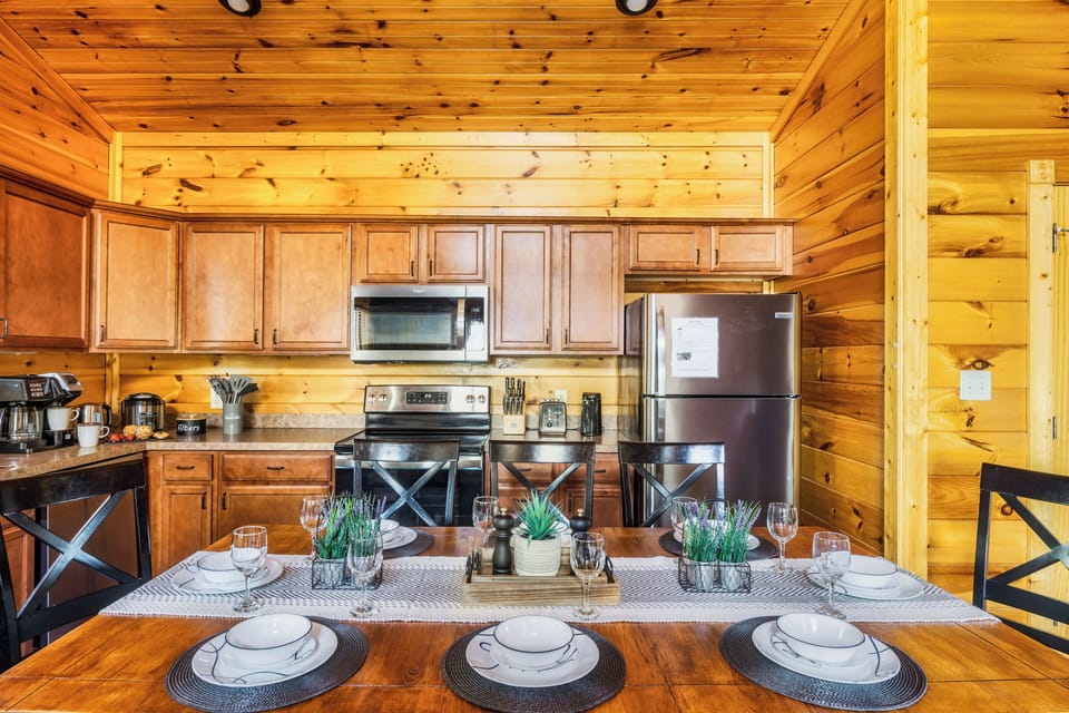 Dining table with a stunning arrangement elevates the space.
