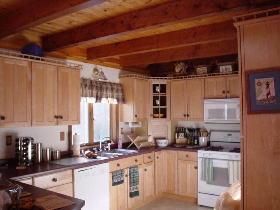 Modern kitchen with gas range/micro/dishwasher and lots of amenities.