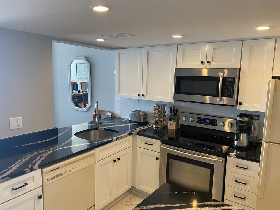 Kitchen with new Silestone Cambria Granite countertops.