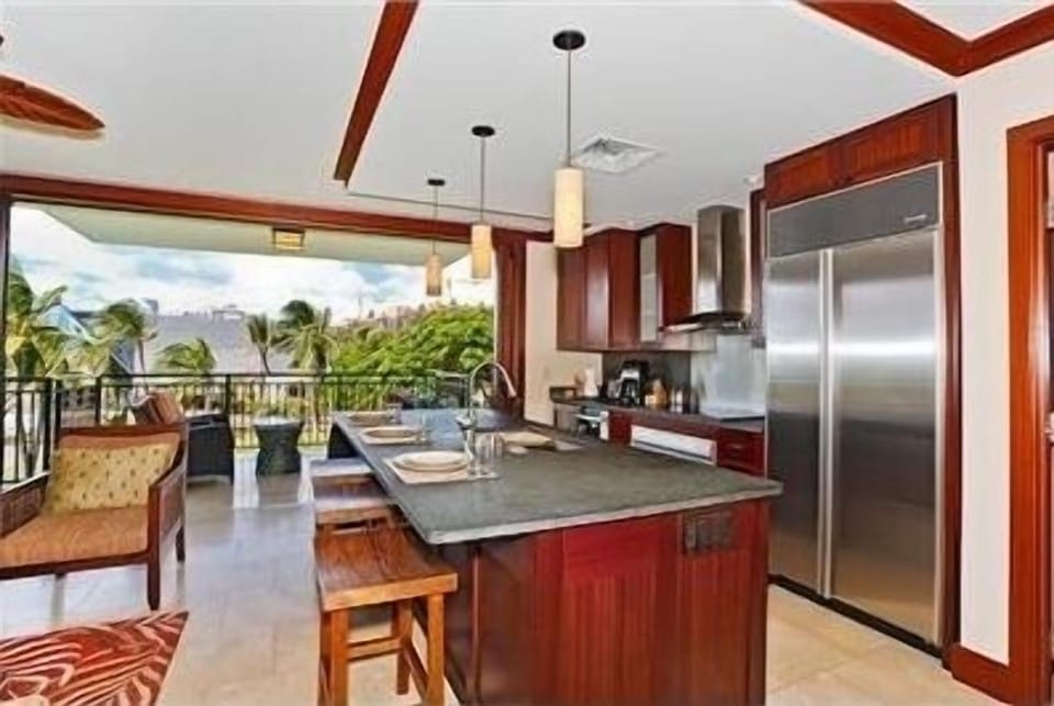 Living Room And Kitchen Opens To Lanai.  Indoor/Outdoor living w/ movable wall