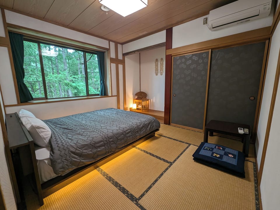Traditional Room | Down comforters, desk, blackout drapes, soundproofing