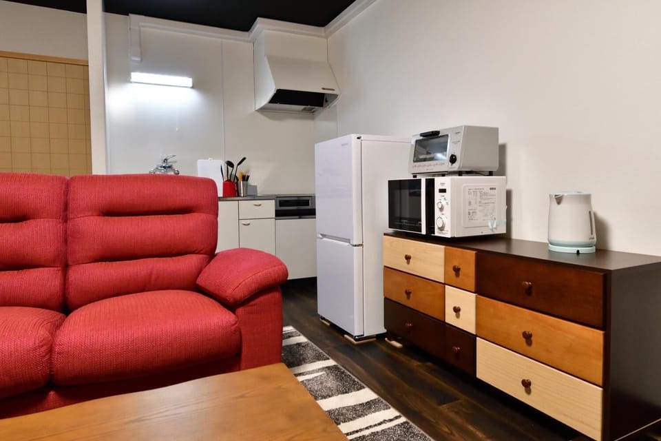 Private Vacation Home 1F | Living room | 50-inch flat-screen TV with digital channels, TV