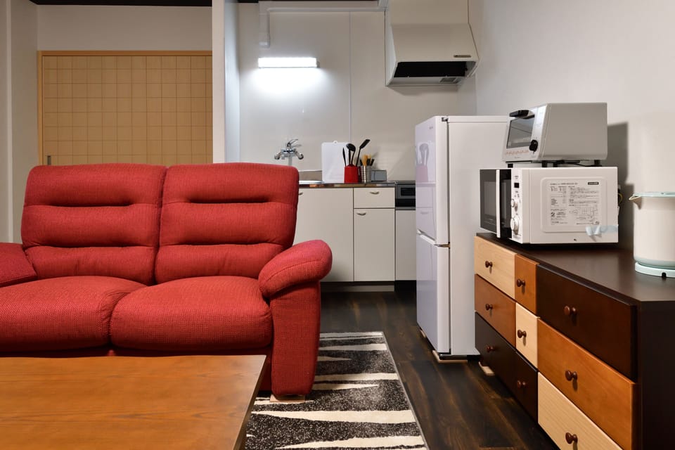 Private Vacation Home 1F | Living area | 50-inch flat-screen TV with digital channels, TV