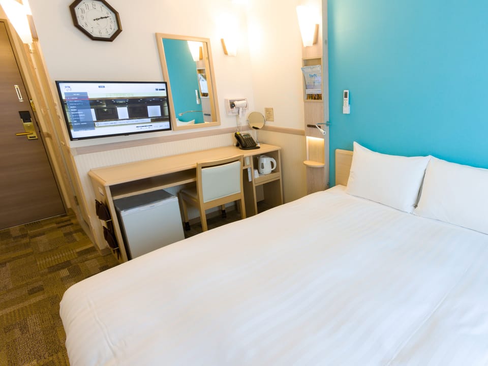 Desk, blackout drapes, iron/ironing board (on request), bed sheets