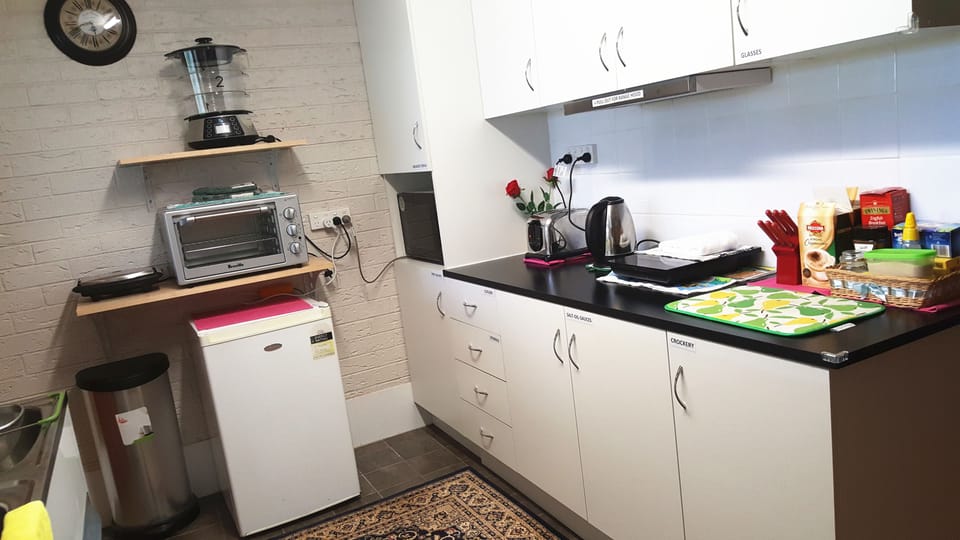 Coffee/tea maker, fridge, microwave, oven