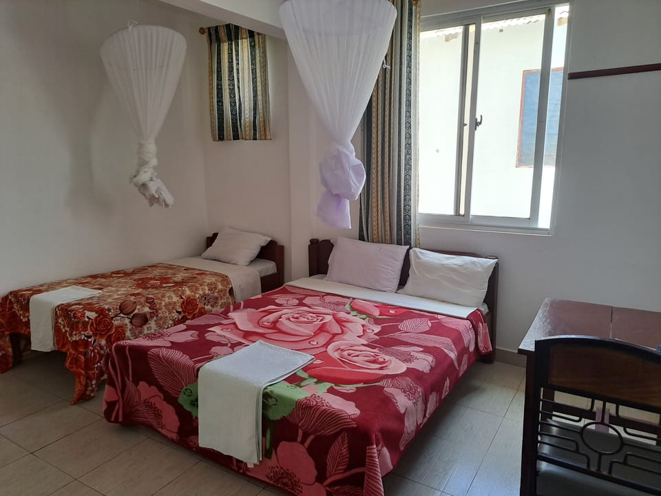 Twin Room, Multiple Beds, Non Smoking | Premium bedding, desk, free WiFi, bed sheets